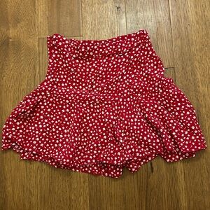 Cute mini red skirt with white flowers